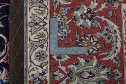 Backside of handmade New Isfahan rug showing knot structure and weave density