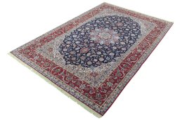 Corner detail of New Isfahan rug showing border pattern and Cork pile