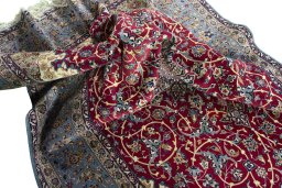 Surface texture of 1970s Isfahan rug with natural Cork and intricate pattern