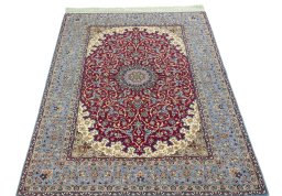 Surface texture of 1970s Isfahan rug with natural Cork and intricate pattern