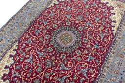 Backside of handmade 1970s Isfahan rug showing knot structure and weave density