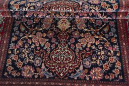 Close-up detail of 1930s Isfahan rug from Iran / Persia showing Wool weave