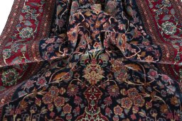 Surface texture of 1930s Isfahan rug with natural Wool and intricate pattern