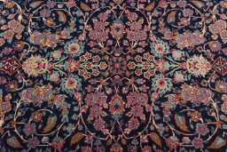 Central medallion detail of 1930s Isfahan rug from Iran / Persia