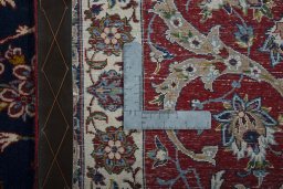 Central medallion detail of 1950s Isfahan rug from Iran / Persia