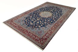 Corner detail of 1950s Isfahan rug showing border pattern and Cork pile