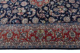 Corner detail of New Isfahan rug showing border pattern and Cork pile