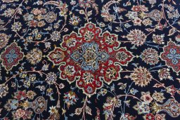 Central medallion detail of New Isfahan rug from Iran / Persia