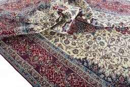Surface texture of 1970s Isfahan rug with natural Cork and intricate pattern