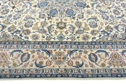 Corner detail of 2000s Isfahan rug showing border pattern and Cork pile