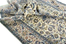 Surface texture of 2000s Isfahan rug with natural Cork and intricate pattern