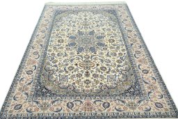 Surface texture of 2000s Isfahan rug with natural Cork and intricate pattern