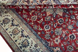 Close-up detail of 1970s Isfahan rug from Iran / Persia showing Cork weave