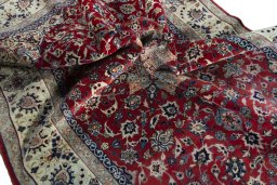 Surface texture of 1970s Isfahan rug with natural Cork and intricate pattern