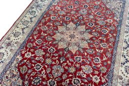 Backside of handmade 1970s Isfahan rug showing knot structure and weave density