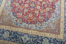 Close-up detail of 1970s Isfahan rug from Iran / Persia showing Cork weave