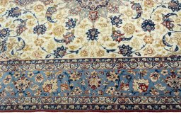 Corner detail of 1950s Isfahan rug showing border pattern and Cork pile