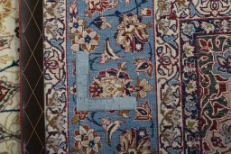 Backside of handmade 1950s Isfahan rug showing knot structure and weave density