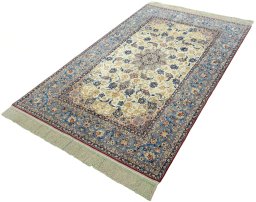 Corner detail of 1950s Isfahan rug showing border pattern and Cork pile