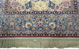 Full view of 1950s Isfahan rug from Iran / Persia, 241 × 148 cm in Beige tones