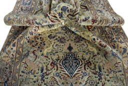 Surface texture of 1970s Isfahan rug with natural Cork and intricate pattern