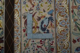 Backside of handmade 1970s Isfahan rug showing knot structure and weave density
