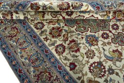 Close-up detail of 1950s Isfahan rug from Iran / Persia showing Wool weave
