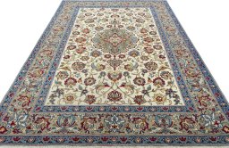 Surface texture of 1950s Isfahan rug with natural Wool and intricate pattern