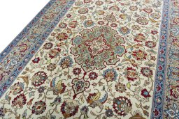 Backside of handmade 1950s Isfahan rug showing knot structure and weave density