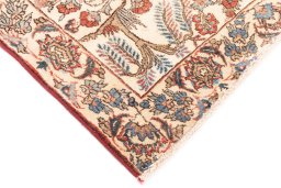 Backside of handmade 2002s Isfahan rug showing knot structure and weave density