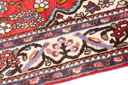 Backside of handmade 1999s Isfahan rug showing knot structure and weave density