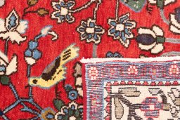 Close-up detail of 1999s Isfahan rug from Iran / Persia showing Wool weave