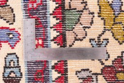 Full view of 1999s Isfahan rug from Iran / Persia, 147 × 102 cm in Red tones