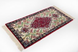 Close-up detail of New Isfahan rug from Iran / Persia showing Wool weave