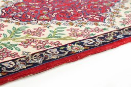 Central medallion detail of New Isfahan rug from Iran / Persia