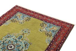 Surface texture of 2000s Isfahan rug with natural Wool and intricate pattern
