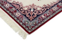 Backside of handmade New Isfahan rug showing knot structure and weave density