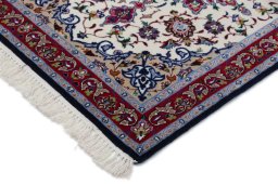 Backside of handmade New Isfahan rug showing knot structure and weave density