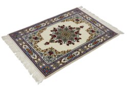 Corner detail of New Isfahan rug showing border pattern and Wool pile