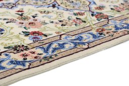 Central medallion detail of New Isfahan rug from Iran / Persia