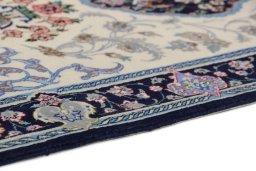 Central medallion detail of New Isfahan rug from Iran / Persia