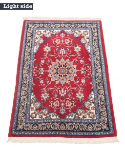 Close-up detail of New Isfahan rug from Iran / Persia showing Wool weave