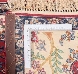 Corner detail of New Isfahan rug showing border pattern and Wool pile