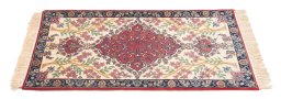 Backside of handmade New Isfahan rug showing knot structure and weave density