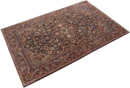 Corner detail of 1920s Kashan rug showing border pattern and Wool pile