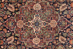 Close-up detail of 1920s Kashan rug from Iran / Persia showing Wool weave