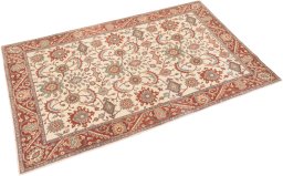 Corner detail of 1990s Kashan rug showing border pattern and Wool pile