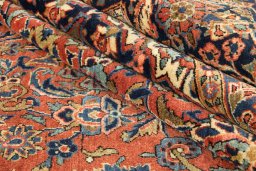 Full view of 1950s Kashan rug from Iran / Persia, 385 × 271 cm in Red tones