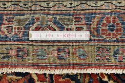 Corner detail of 1950s Kashan rug showing border pattern and Wool pile