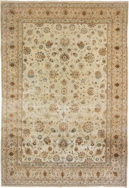 Full view of 1950s Kashan rug from Iran / Persia, 475 × 323 cm in Cream tones